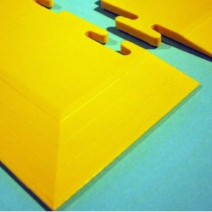 bright yellow floor tile corner ramp