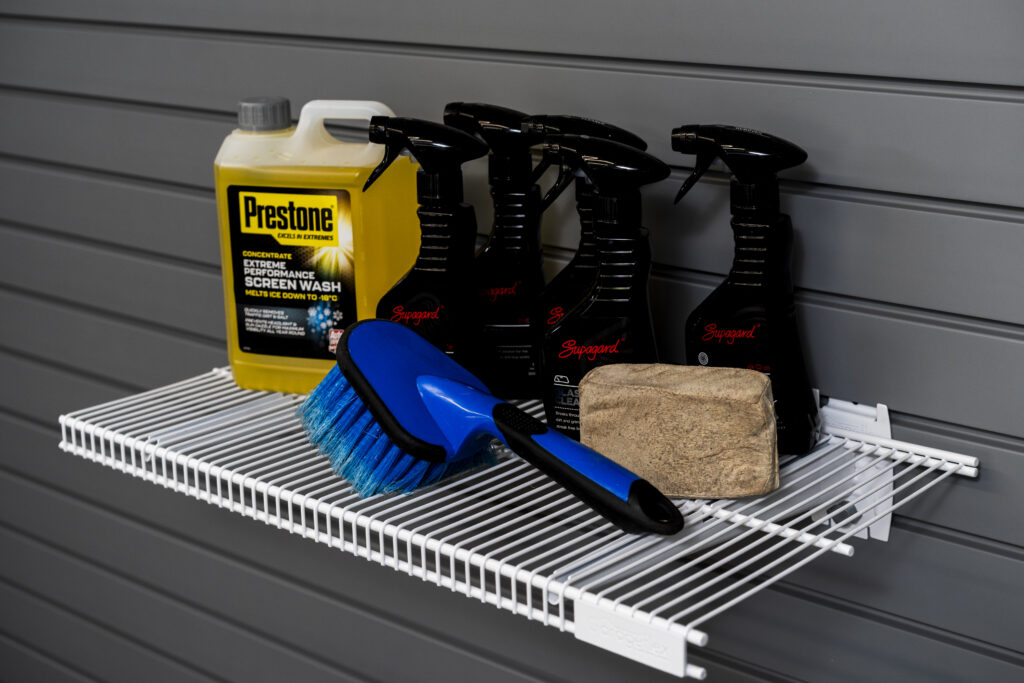 bracket shelf holding car cleaning products