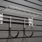 Shelf with hooks attached to slatwall